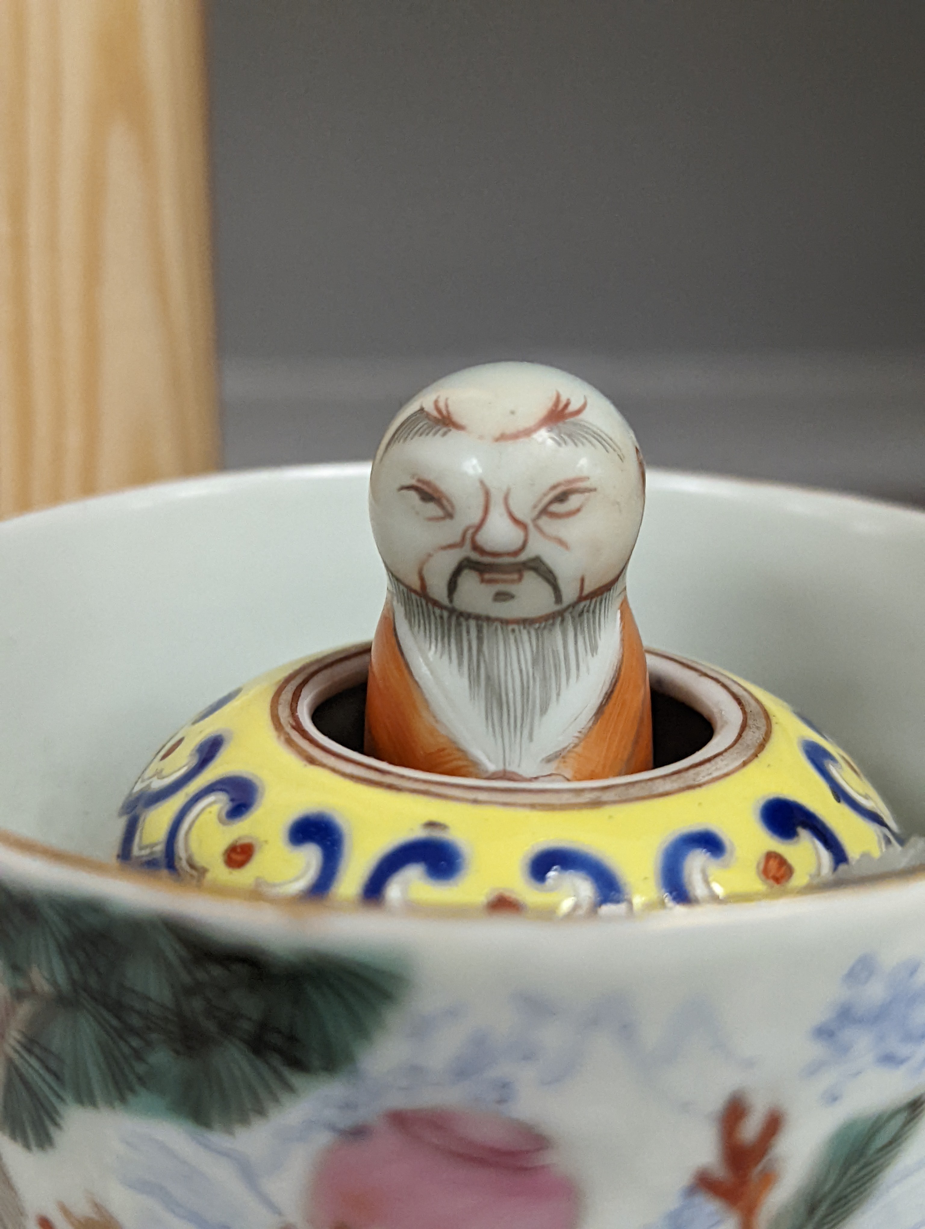 A Chinese famille rose puzzle cup, 8cm high